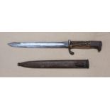 A bayonet with antler handle and scabbard