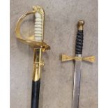 Two swords, one blade marked Wilkinson, possibly Masonic and one other sword