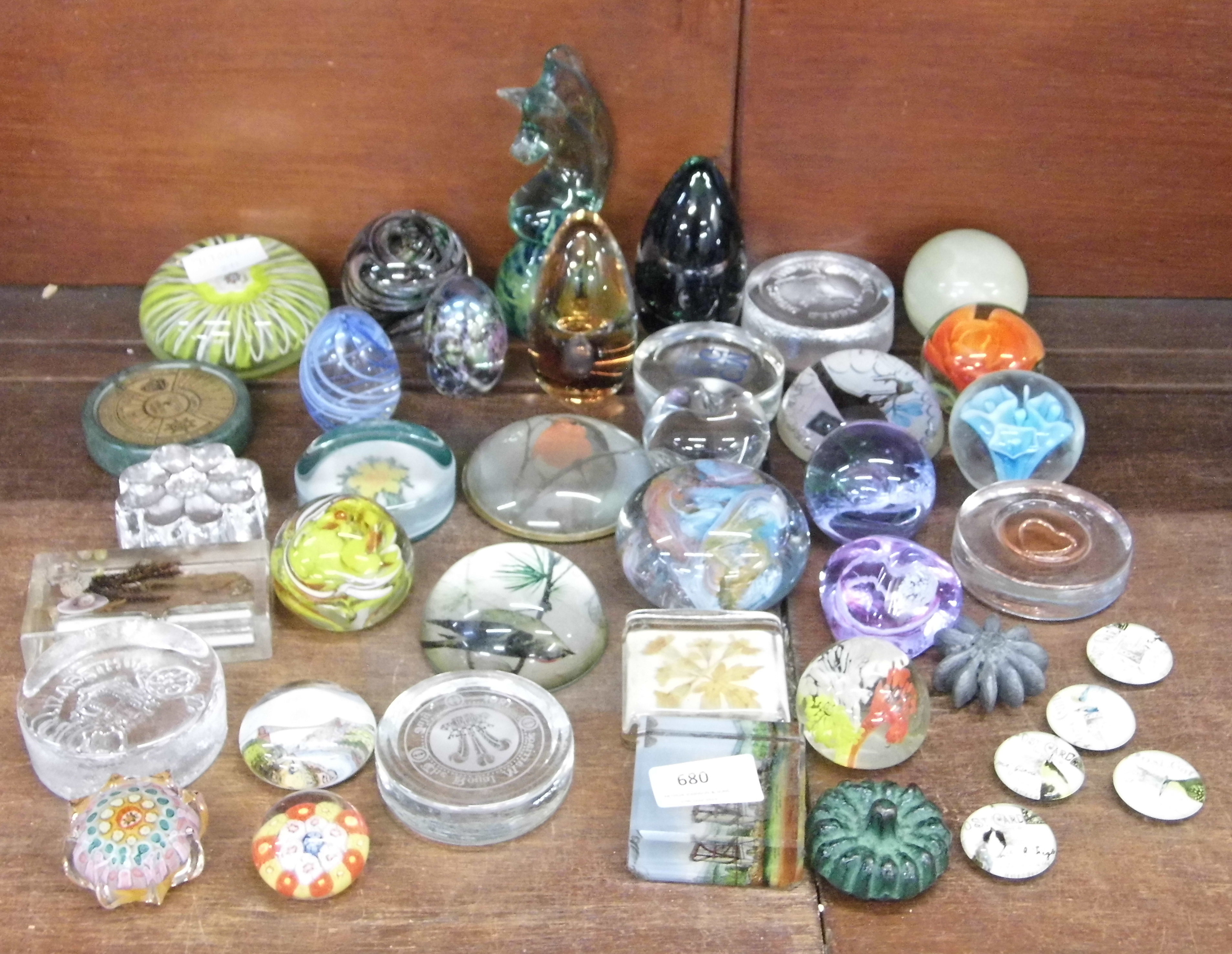 A quantity of glass paperweights