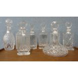 Eight glass spirit decanters