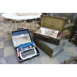 Majesty Publications, a typewriter, two suitcases, one other case, books and brassware, etc.