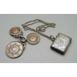 A silver vesta case, chain and three silver boxing fob medals including one Lincolnshire Regiment