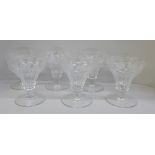A set of six large glasses with etched decoration of grapes and vines