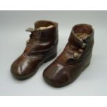 A pair of late 19th Century children's leather shoes