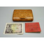 A booklet of Edward VIII postage stamps, a 1942 Spanish banknote and a walnut box