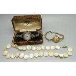 A silver wristwatch, a lady's 9ct gold cased wristwatch and a small mother of pearl necklace