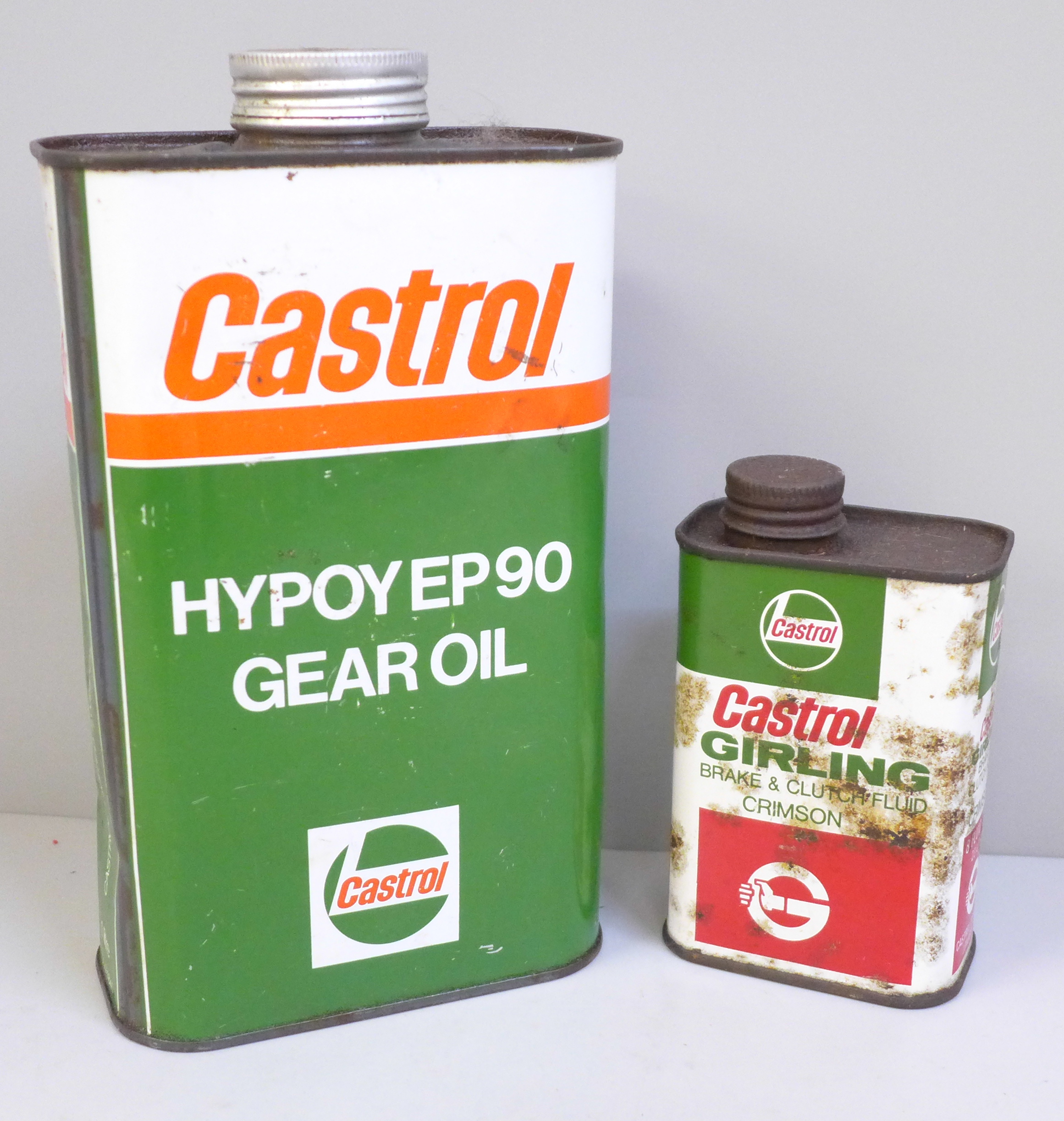 A Castrol Gear oil can and a Castrol Girling brake and clutch fluid bottle, both with contents