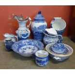A box of assorted blue and white china