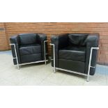 A pair of Bauhaus style black leather and chrome LC2 model armchairs, after Le Corbusier