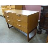 A Europa teak chest of drawers