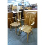 A pair of Ercol style Blonde elm and beech chairs