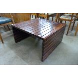 An Elamisen Iloksi teak coffee table, designed for Vilka