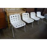 A set of four Robin Day tubular steel and white Perspex Polo stacking chairs