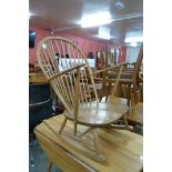 An Ercol Blonde elm and beech 315 model rocking chair