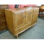 An Ercol Blonde elm and beech sideboard