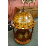 A terrestrial globe cocktail cabinet/trolley