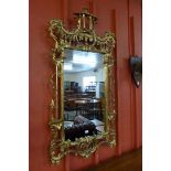 A Chinese Chippendale style pagoda topped gilt framed mirror