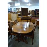 A G-Plan Fresco teak extending dining table and five chairs