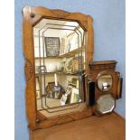 An Art Deco oak aneroid barometer, mirror and brush set and an oak mirror