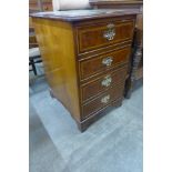 A Charles Lowe burr walnut leather topped filing cabinet