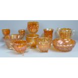 Ten items of marigold carnival glass, three goblets and a two handled basket, etc. **PLEASE NOTE