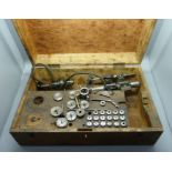 A watchmaker's lathe, 8mm with collets and step chucks, cased