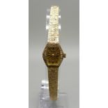 A lady's 9ct gold Accurist wristwatch with integral strap, gross weight 19.9g