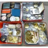 Four boxes of watchmaker's pocket watch parts, cases and movements