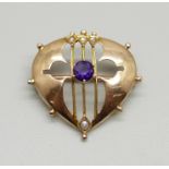 A 9ct gold Arts and Crafts brooch set with an amethyst and seed pearls, makers mark H.H,