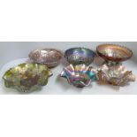 Six items of iridescent green, amber and amethyst carnival glass, Fenton green Autumn acorns,