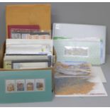 Stamps; a box of stamp albums, covers, presentation packs, etc.