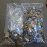 Two bags of costume jewellery and watch parts