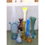 A collection of coloured glass vases
