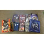 A Doctor Who Tardis, a Dalek and books
