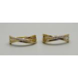A pair of silver gilt hoop earrings, each set with 5 small diamonds