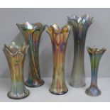 Two Fenton diamond and rib carnival glass vases and three others