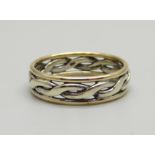 A 9ct bi colour gold Celtic style ring, 5.4g, V