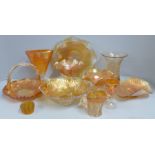 Ten items of marigold carnival glass, a crackle glaze celery vase, iridescent dished and bowls,