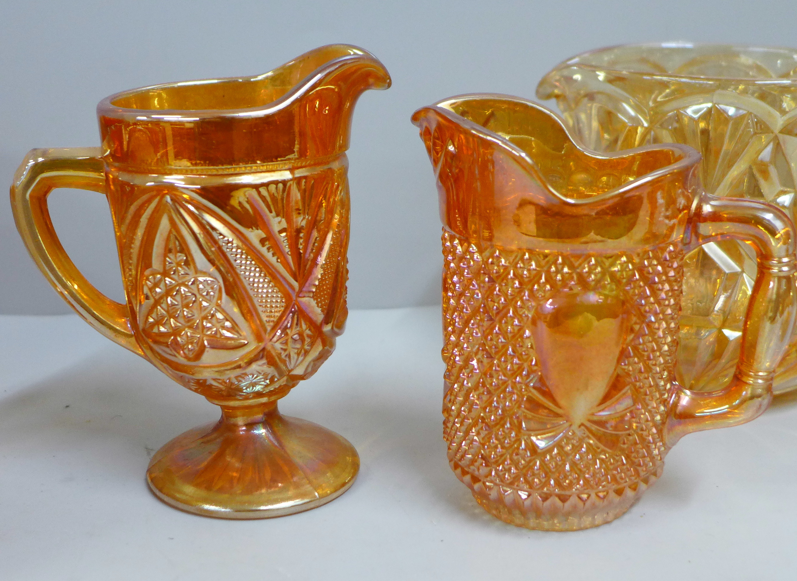 Ten items of marigold carnival glass, five jugs/pitchers, two pedestal bowls, other bowls - Image 5 of 7