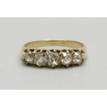 An antique yellow metal and five stone diamond ring, approximately 1.5ct diamond weight, stamped