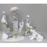 Four Lladro figures including dog and children on see-saw, one other similar of a lady with umbrella