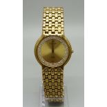 An 18ct gold plated Raymond Weil wristwatch, plating worn on bracelet