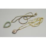 A silver gilt and diamond pendant on chain, and a green stone silver gilt pendant on chain