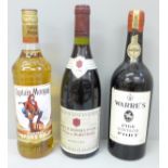 Three bottles:- Warre's 1966 Vintage Port, Captain Morgan Spiced Gold Rum and Nuits St. Georges