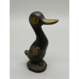 A 1950s bronze model of a duck, the based marked 'England', 7cm