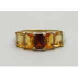 A 9ct gold, garnet and citrine ring, 2.8g, R