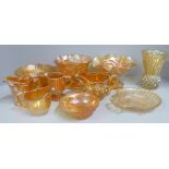 Ten items of marigold carnival glass, Imperial Snow Fancy jug, three other jugs, bowls and vases **