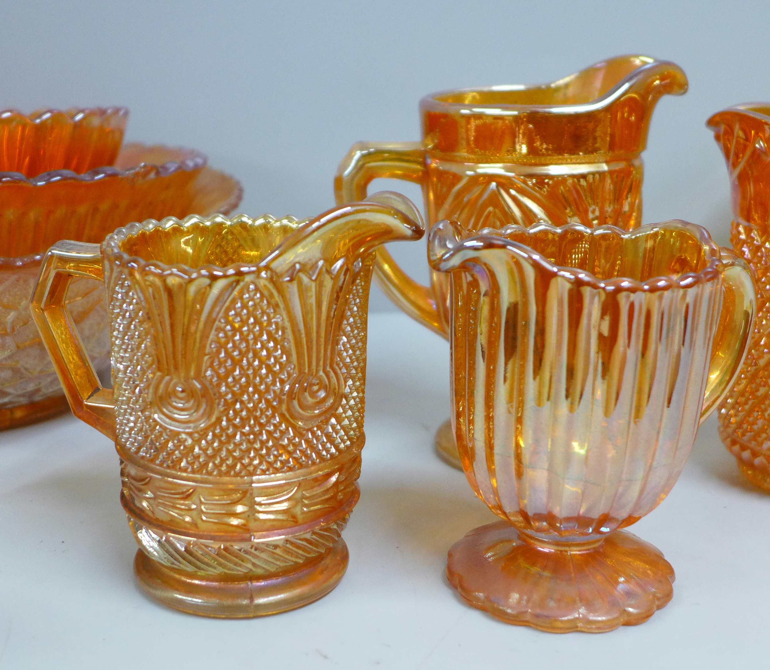 Ten items of marigold carnival glass, five jugs/pitchers, two pedestal bowls, other bowls - Image 6 of 7