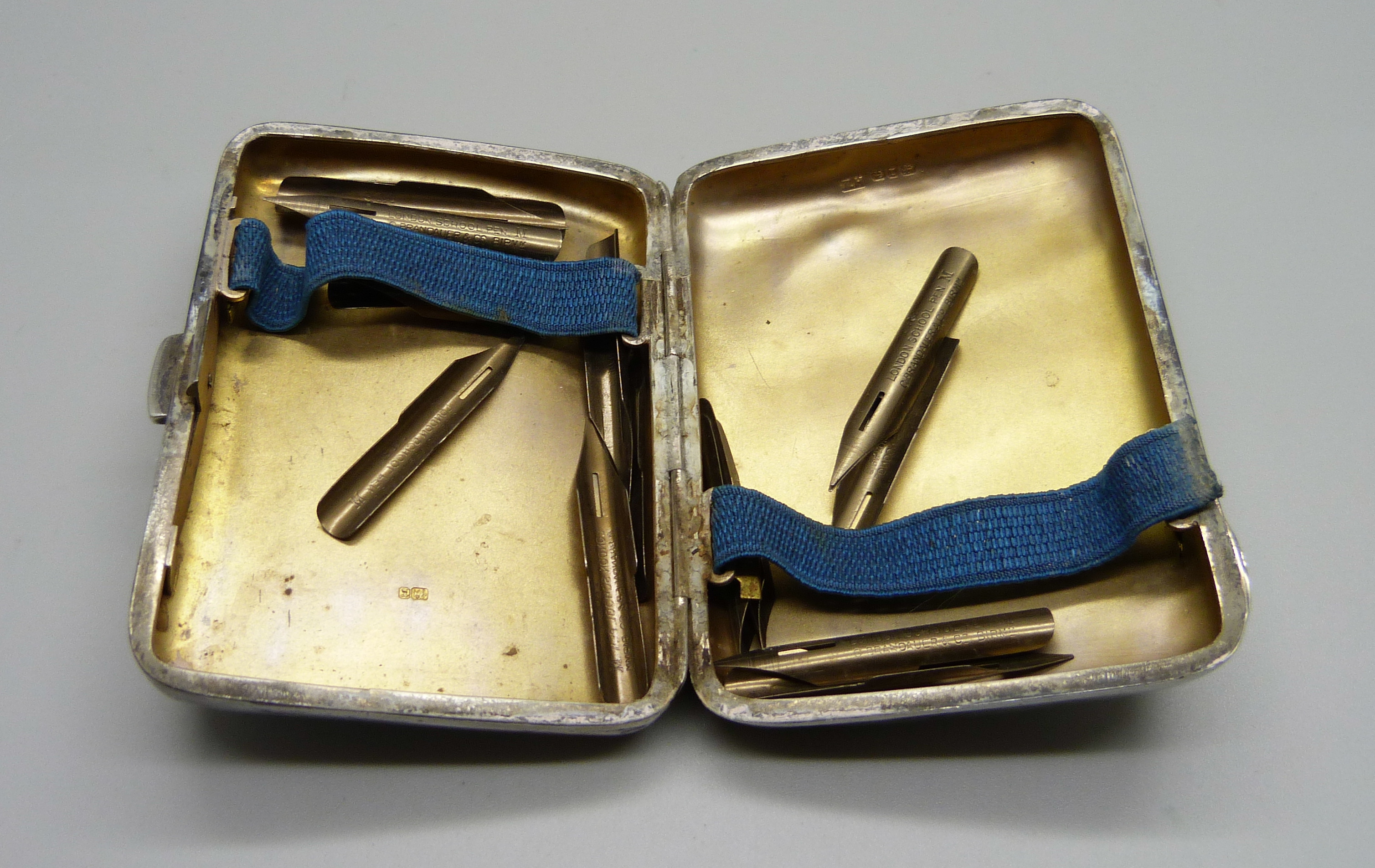 A Victorian silver cigarette case with inscription, 84g, and a collection of pen nibs - Image 3 of 4