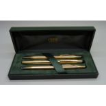 A 14ct rolled gold pen and pencil set, fountain pen with 14k gold nib, cased